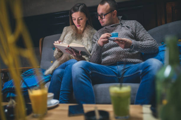 istock Couple Of Students Learning At Home On A Sofa 903353068