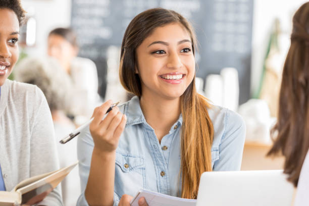 istock Female college students study in coffee shop 903353242