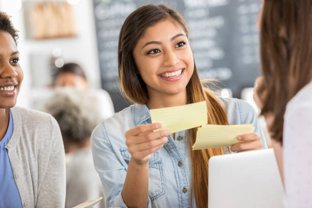 istock College girls study for exam in coffee shop 903353256
