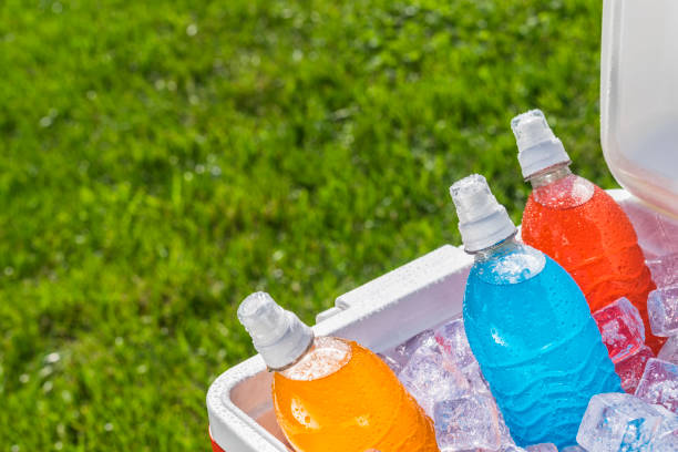 istock Various ice cold colorful sports drinks on ice in cooler on a hot day 903353528