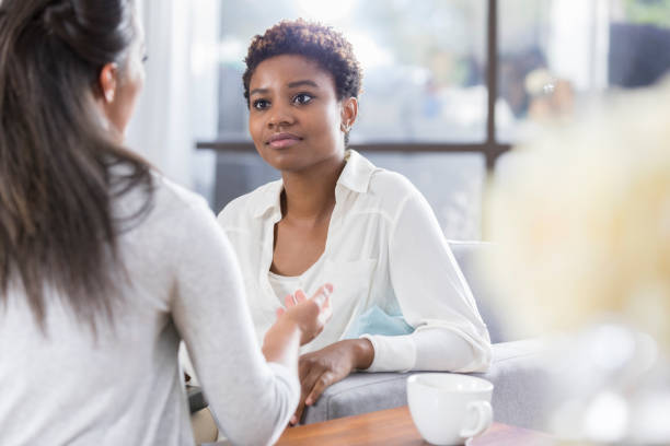 istock Therapist counsels female client 903353930