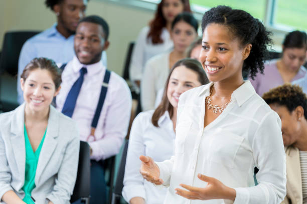 istock Confident African American businesswoman asks question during seminar 903354110
