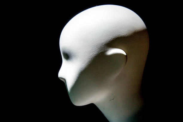 istock Mannequin face with moody lighting 903357328