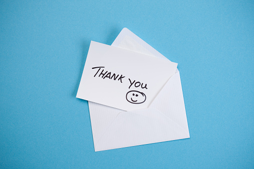 Thank you note on blue background
