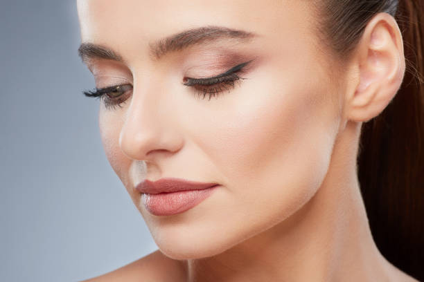 istock Beautiful girl with nude make up at studio 903357942