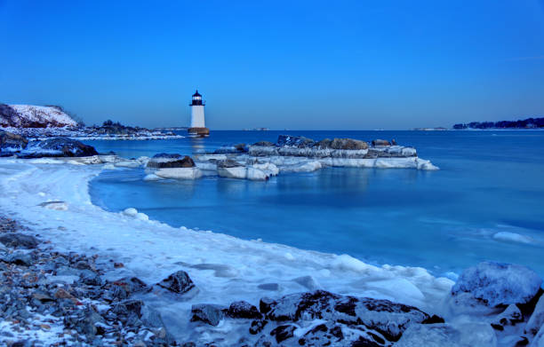 istock Salem's Fort Pickering Light in Winter 903370586