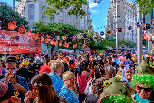 It's February: local people and tourists celebrate the carnival in the streets of the city center of Santa Cruz de Tenerife with funny costumes. The Carnival of Santa Cruz de Tenerife is considered the second most popular carnival in the world, after the one of Rio de Janeiro.