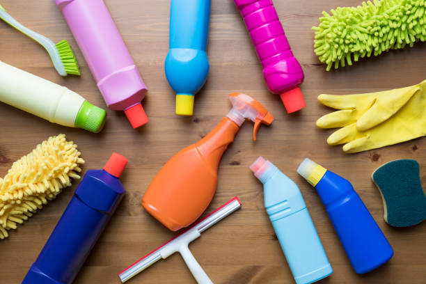 istock House cleaning product on wood table 903379326