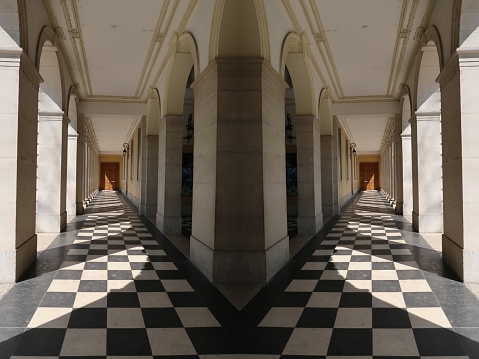 Grenoble, France – April 07, 2017: photography showing a hall of a building. The photography showed an optical illusion created with a mirror effect. The photography was taken from the city of Grenoble.