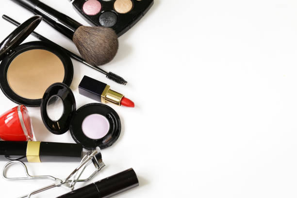 istock set cosmetics for makeup - brushes and eye shadows, lipstick and nail polish 903390982