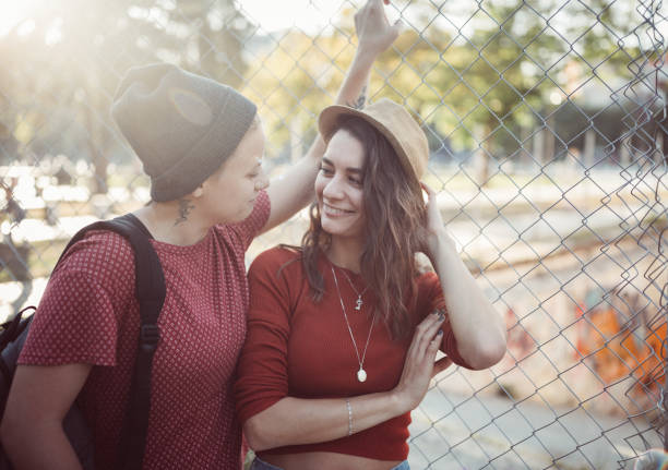 istock Flirting couple standing outside 903397354