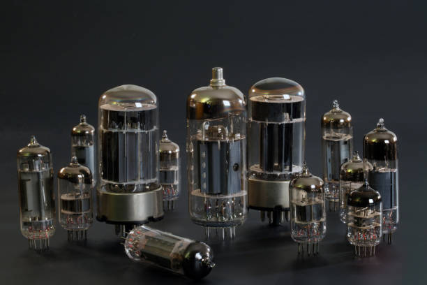 istock Radio tubes of different sizes on a gray background 903401226