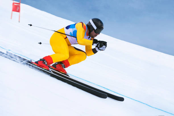 istock Side View of Young Male Skier at Downhill Ski Training 903401570
