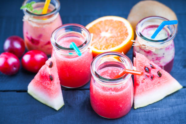 istock Jars with smoothies and fruits 903406926