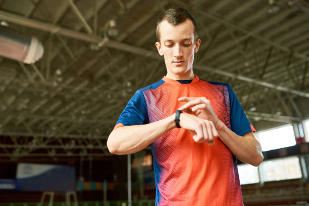 istock Sportsman  Checking Fitness Tracker 903412772