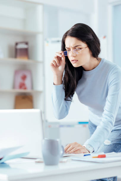 istock Worried nice woman checking report 903413038