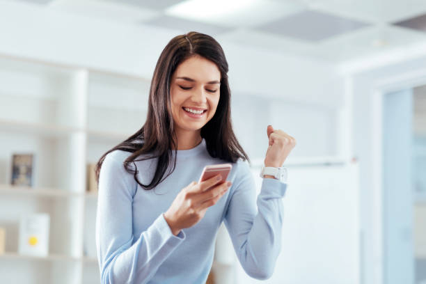 istock Adorable cheerful  woman checking new 903413062