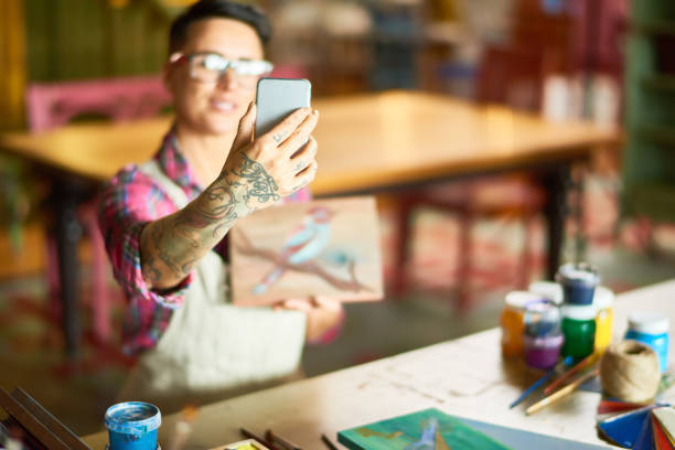 Modern Female Artist Taking Selfie