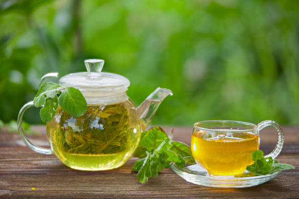 istock delicious green tea in a beautiful glass bowl on table 903415110