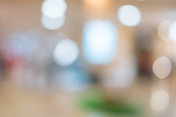 istock Store, shopping mall abstract defocused blurred background 903417350