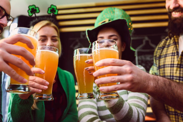 Group of Friends Celebrating St Patrick's Day at Beer Pub