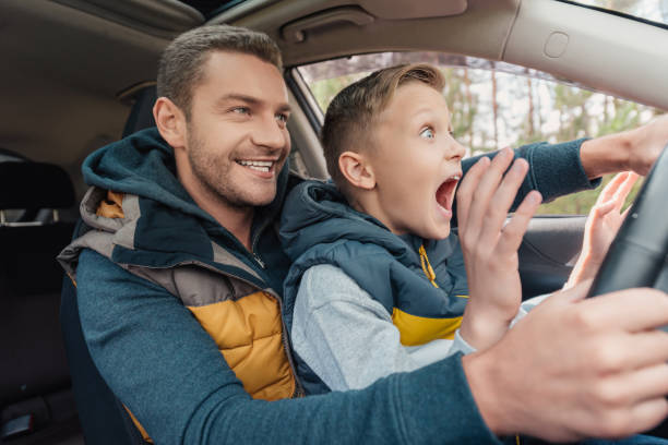 istock father and son in car 903424526