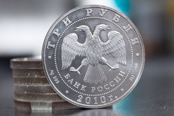 istock Silver coin three rubles - St. George Shoots the Dragon. Russia 903428600