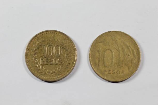 istock Old coins from Uruguay isolated on white background 903431436