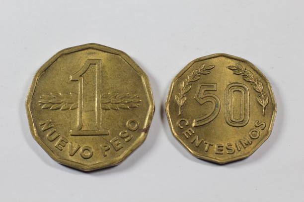 istock Old coins from Uruguay isolated on white background 903431808