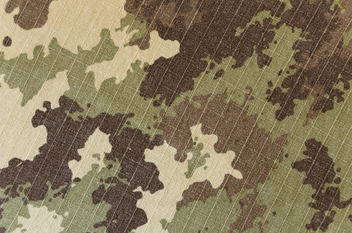 Military vegetato camouflage rip-stop fabric texture background