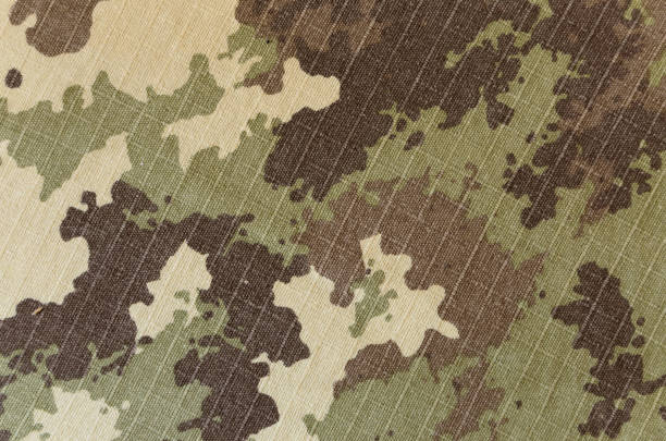 Military vegetato camouflage rip-stop fabric texture background stock photo