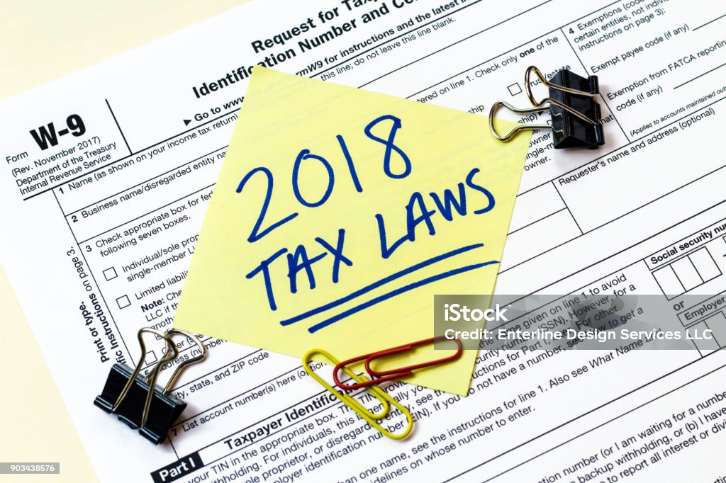 W9 2018 Tax Laws Concept A 2018 Federal income tax laws W9 form. Tax Stock Photo