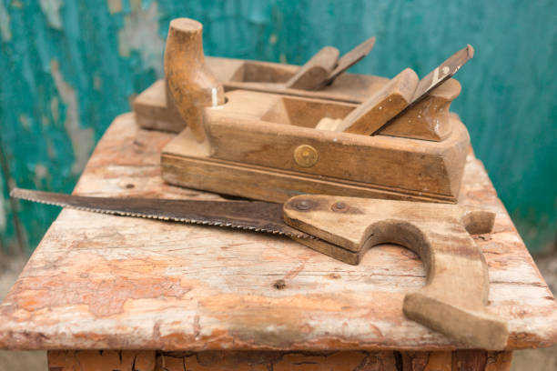 istock tools on an old wooden table, woodwork, cracks and scratches 903450388