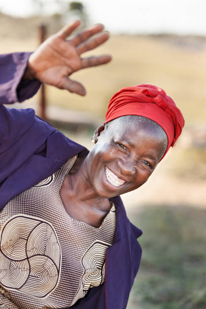 istock african senior citizen woman greeting 903450668