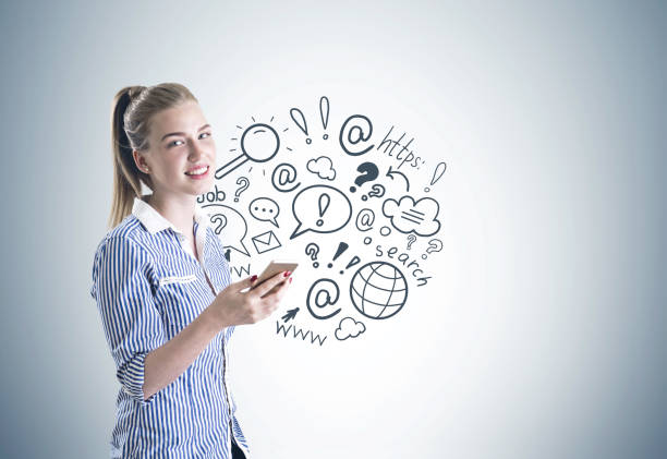 istock Cheerful blonde woman, smartphone, internet search 903450868