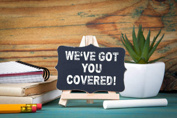 istock Weve got you covered. small wooden board with chalk on the table 903456196