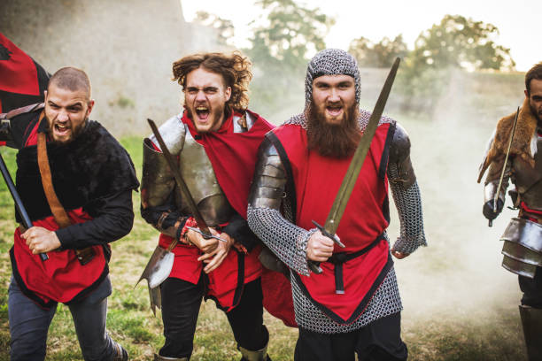 istock Group of brave heroes in medieval times going into war 903456678
