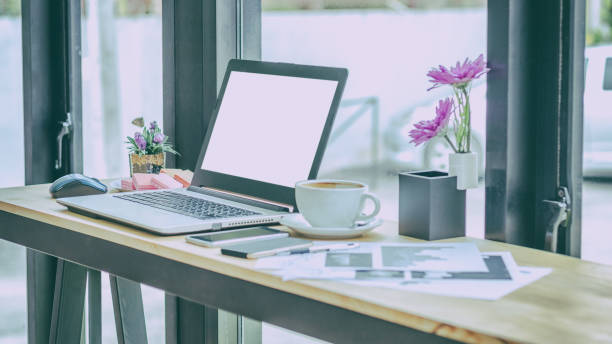 istock Woman Working in Coffee Shop 903457126