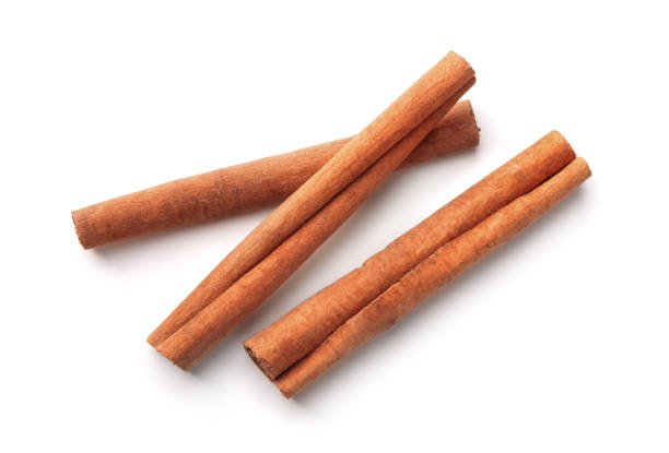 Cinnamon sticks Top view of cinnamon sticks isolated on white cinnamon photos stock pictures, royalty-free photos & images