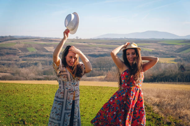 istock two happy women on the meadow 903486358