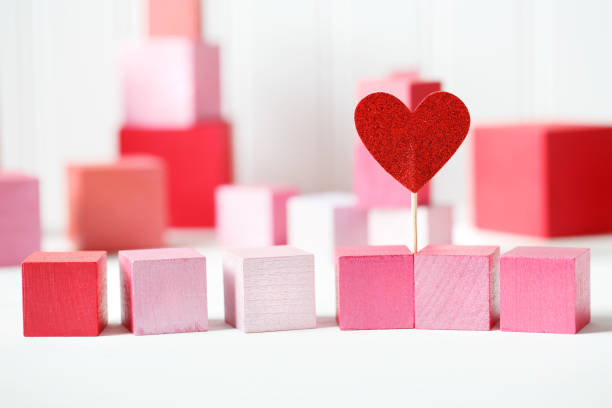 istock Red and pink wooden blocks with small heart 903488050