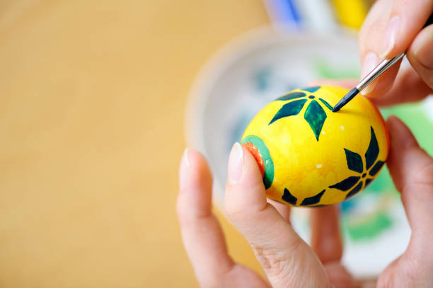 Hand painted Ukrainian Easter eggs decorated with folk designs using a wax resist method.