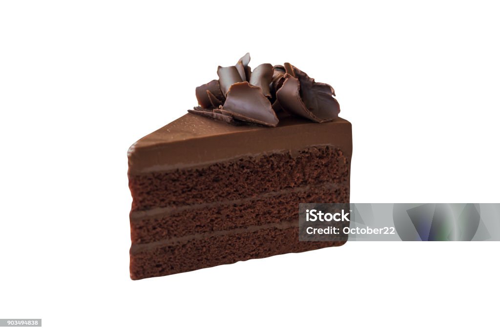 Triangle shape slice piece of chocolate fudge cake decorated with chocolate curl on white isolated and clipping paths. Delicious and soft, sweet and bitter. Homemade bakery concept. Cake Stock Photo