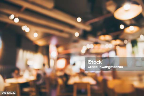 Restaurant Cafe Or Coffee Shop Interior With People Abstract Blur Background Stock Photo - Download Image Now
