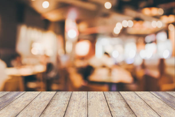 istock Restaurant cafe or coffee shop interior with people abstract blur background 903495044
