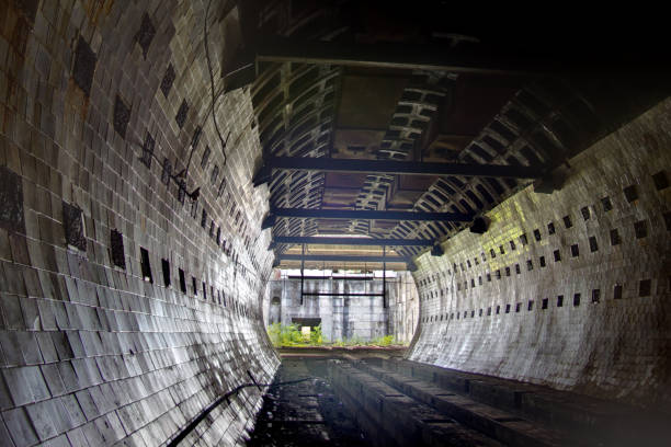 istock Round tiled tunnel in abandoned underground nuclear physics laboratory 903498356