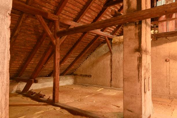 istock Attic loft insulation. Old loft. renovation and thermal insulation with mineral rock wool. 903498518