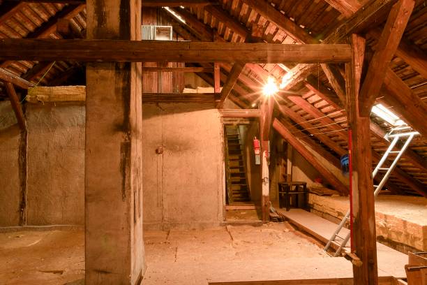 istock Attic loft insulation. Old loft. renovation and thermal insulation with mineral rock wool. 903498542
