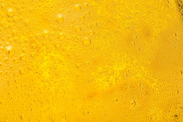 Close up of beer bubbles and foam as a background