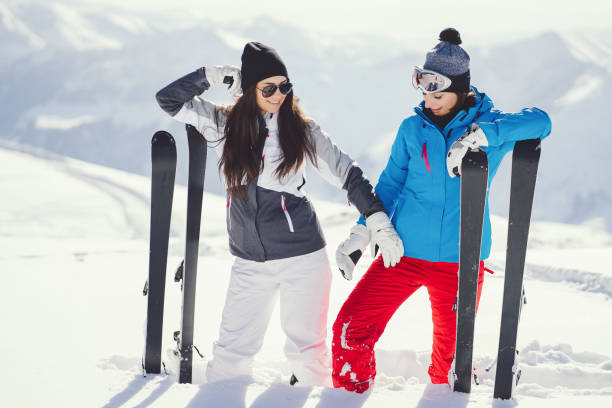 istock girls with ski 903512724